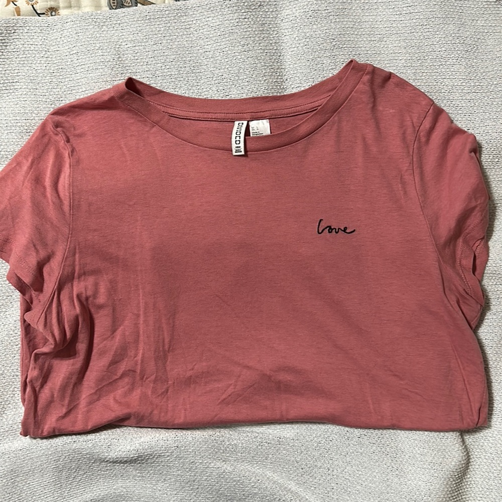 Rose colored short sleeve shirt